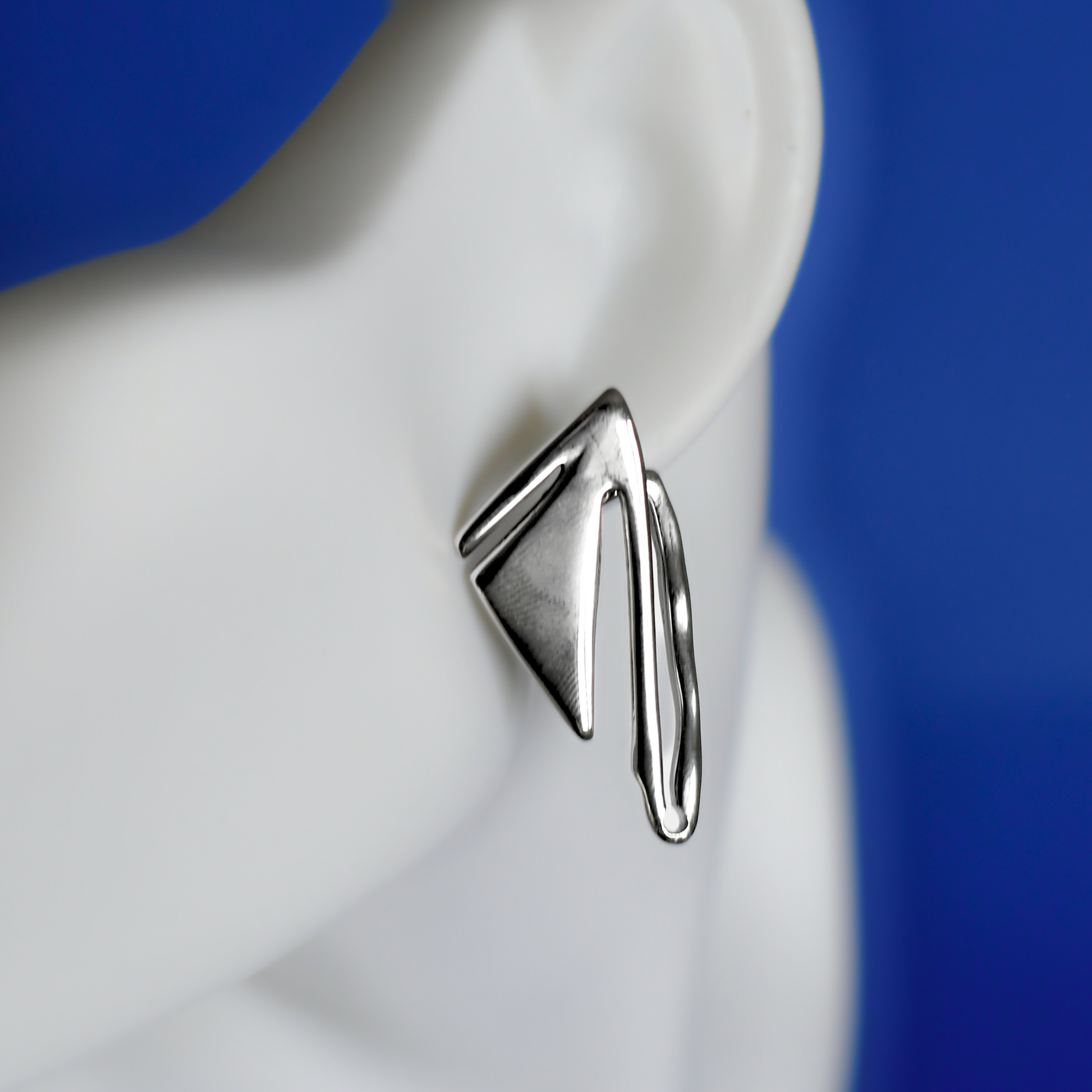 ALNEA silver stainless steel earring on ear - Alogan