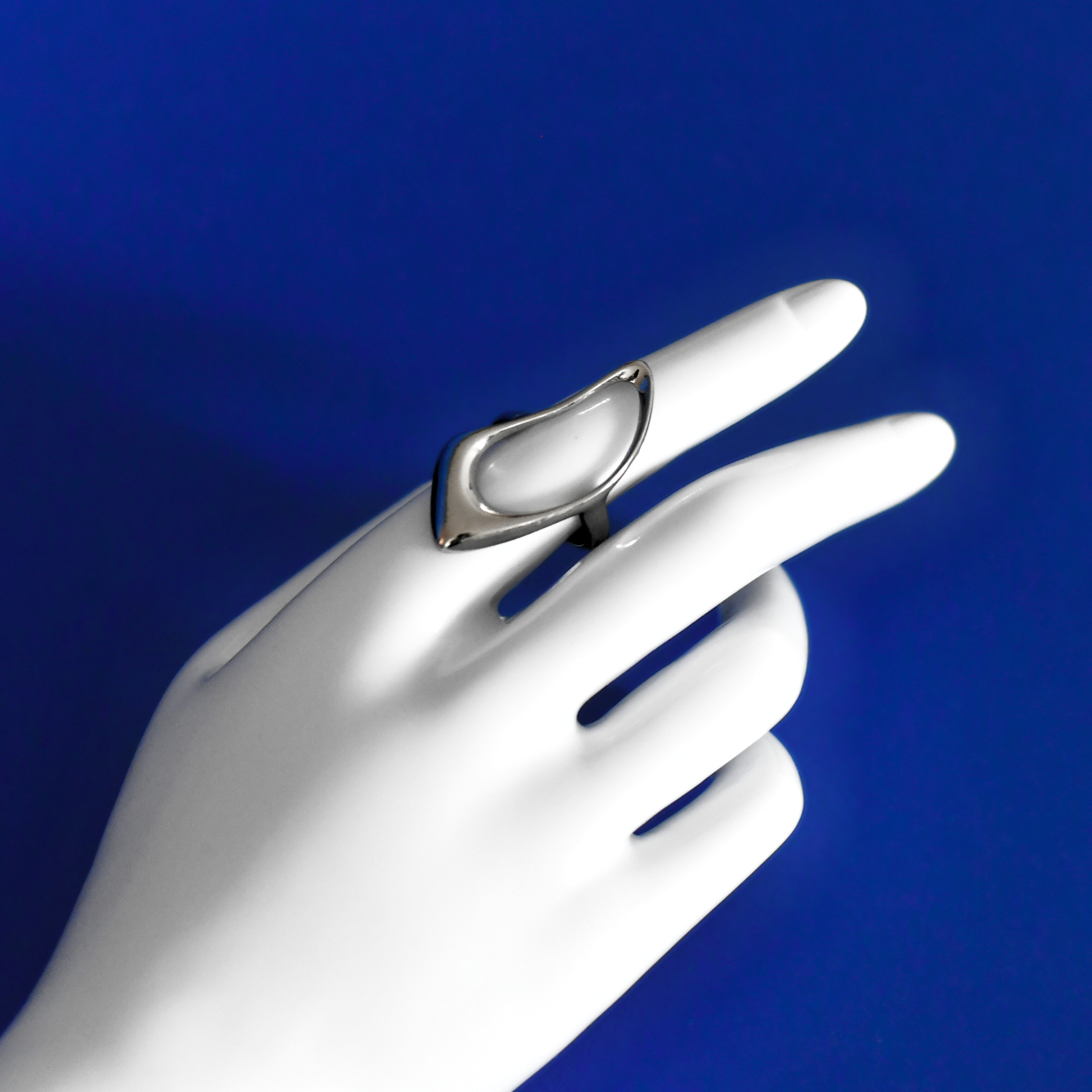 FENTE stainless steel ring with futuristic elegance style in silver on finger