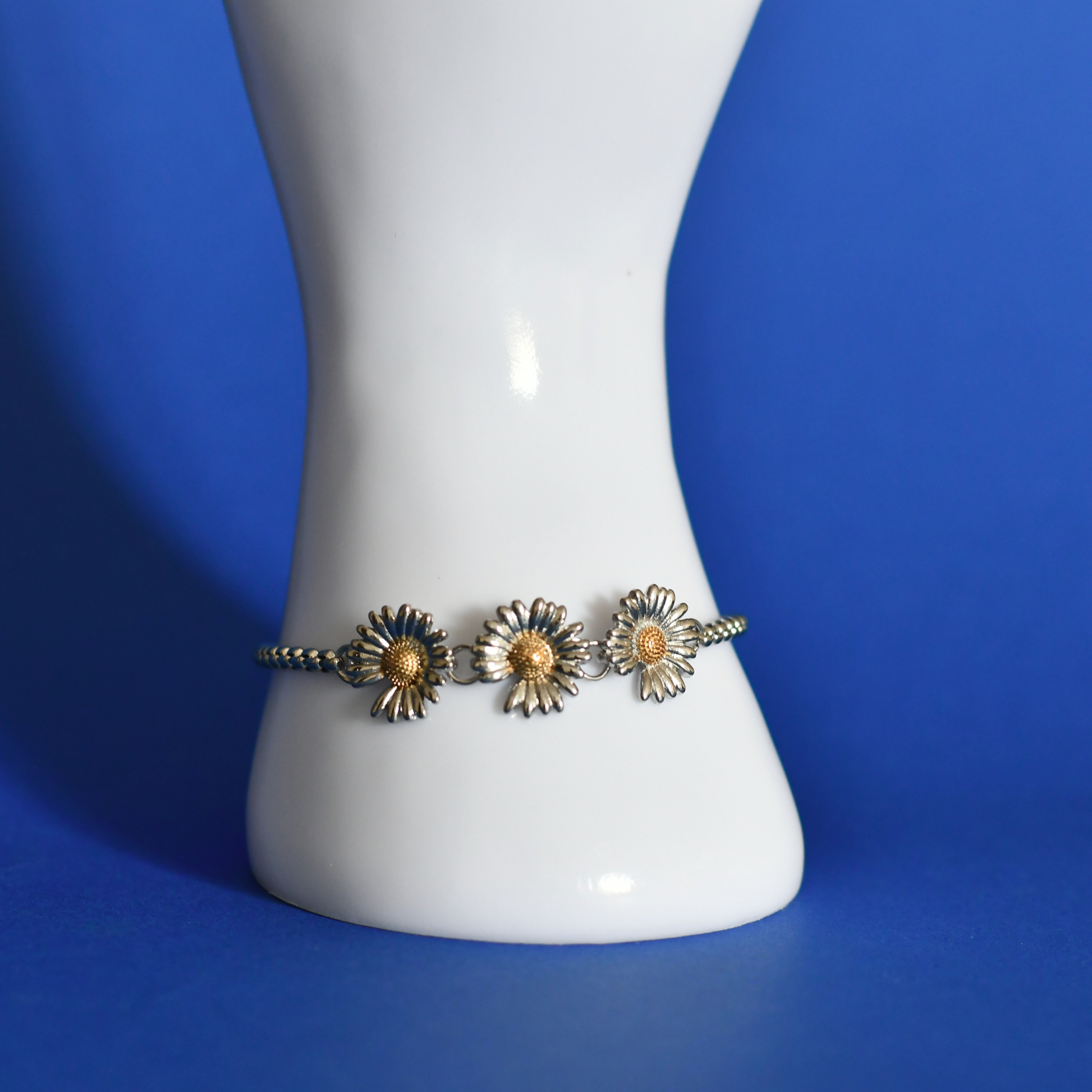 METARITE stainless steel daisy flower bracelet in silver 