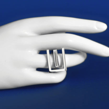 PROLIBE stainless steel statement ring in silver on finger - Alogan