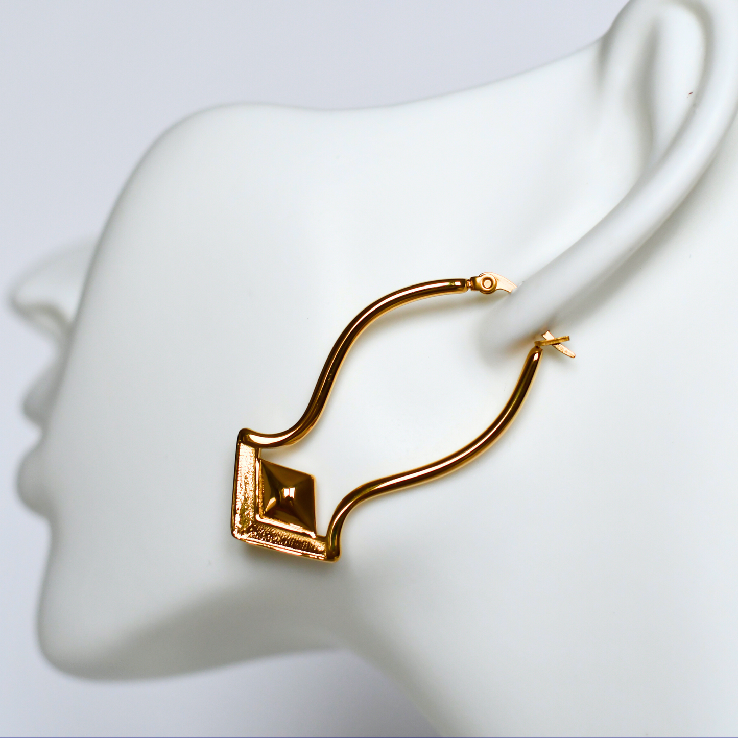 SENTARA stainless steel earrings in gold on ear - Alogan