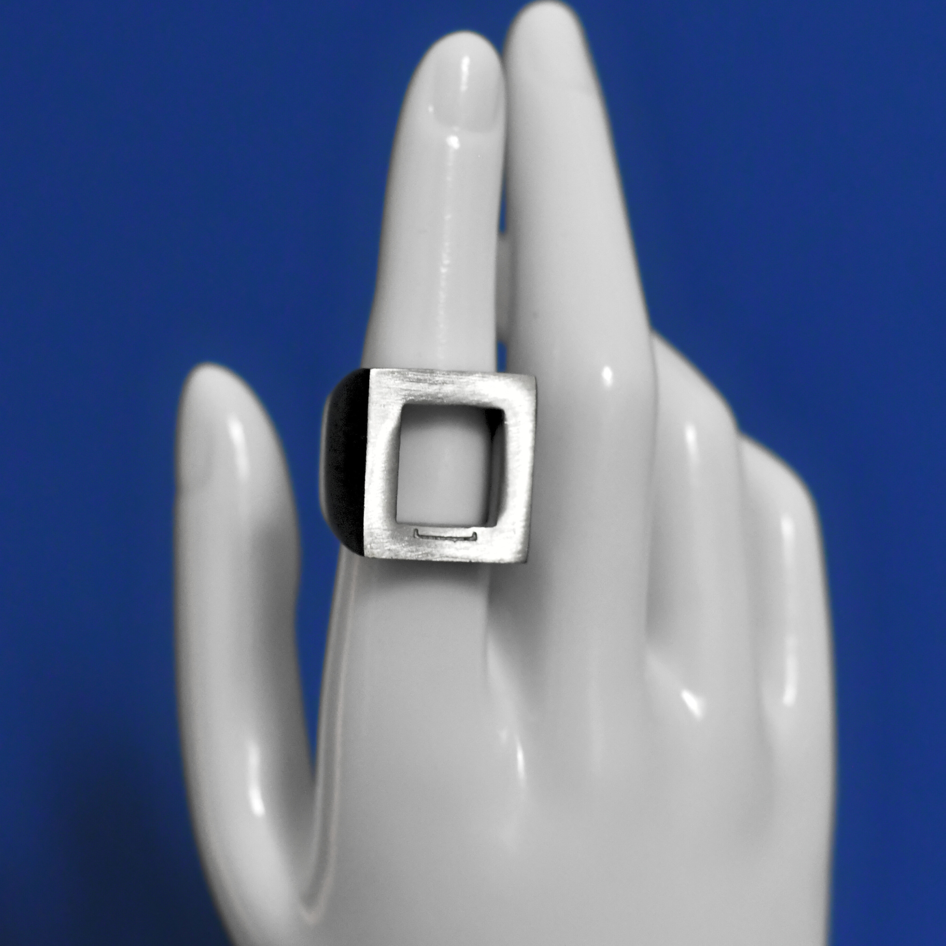 SOLIDE stainless steel bold fashion ring in silver on finger