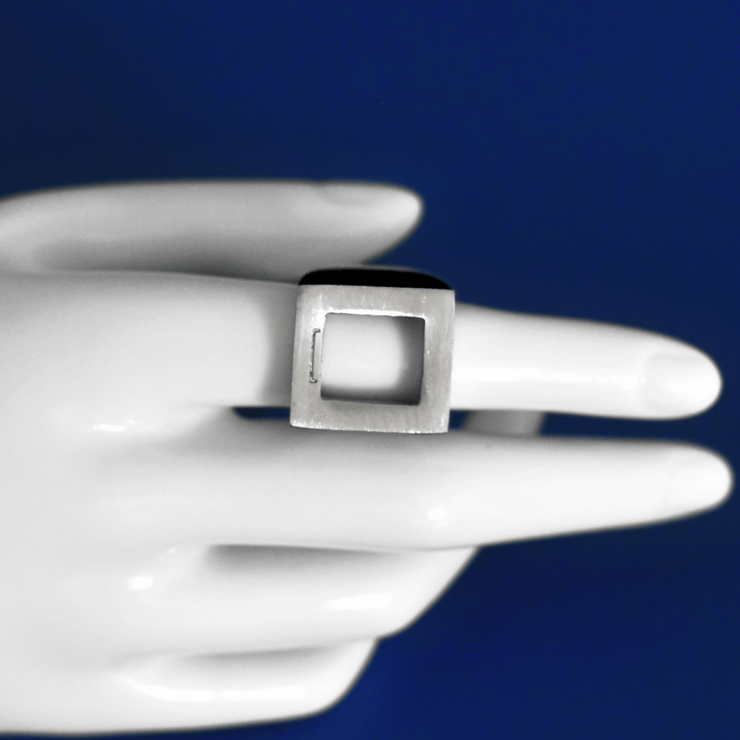SOLIDE stainless steel bold fashion ring in silver on finger - Alogan