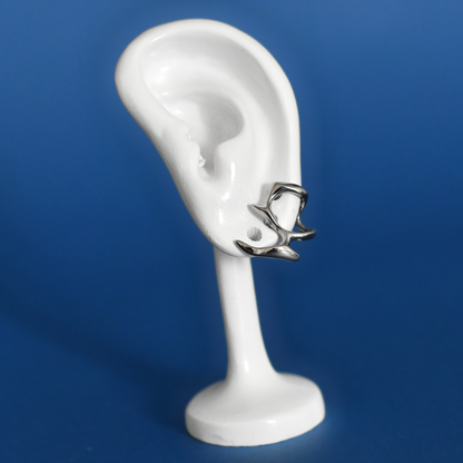 TRAME stainless steel earrings in silver on ear - Alogan