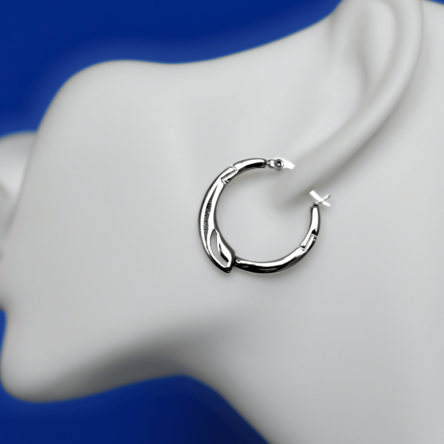 TRESSE stainless steel unique earrings in silver on ear - Alogan