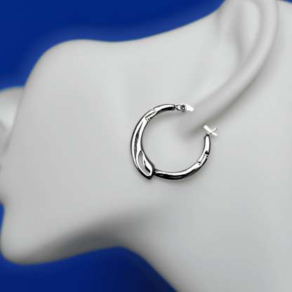 TRESSE stainless steel unique earrings in silver on ear - Alogan