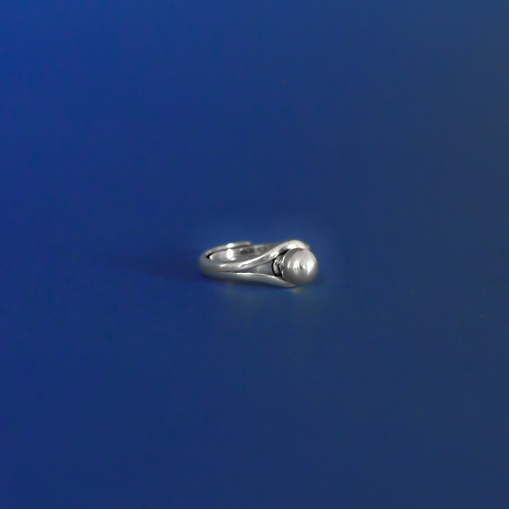 COSMO sterling silver adjustable ring with futuristic design 
